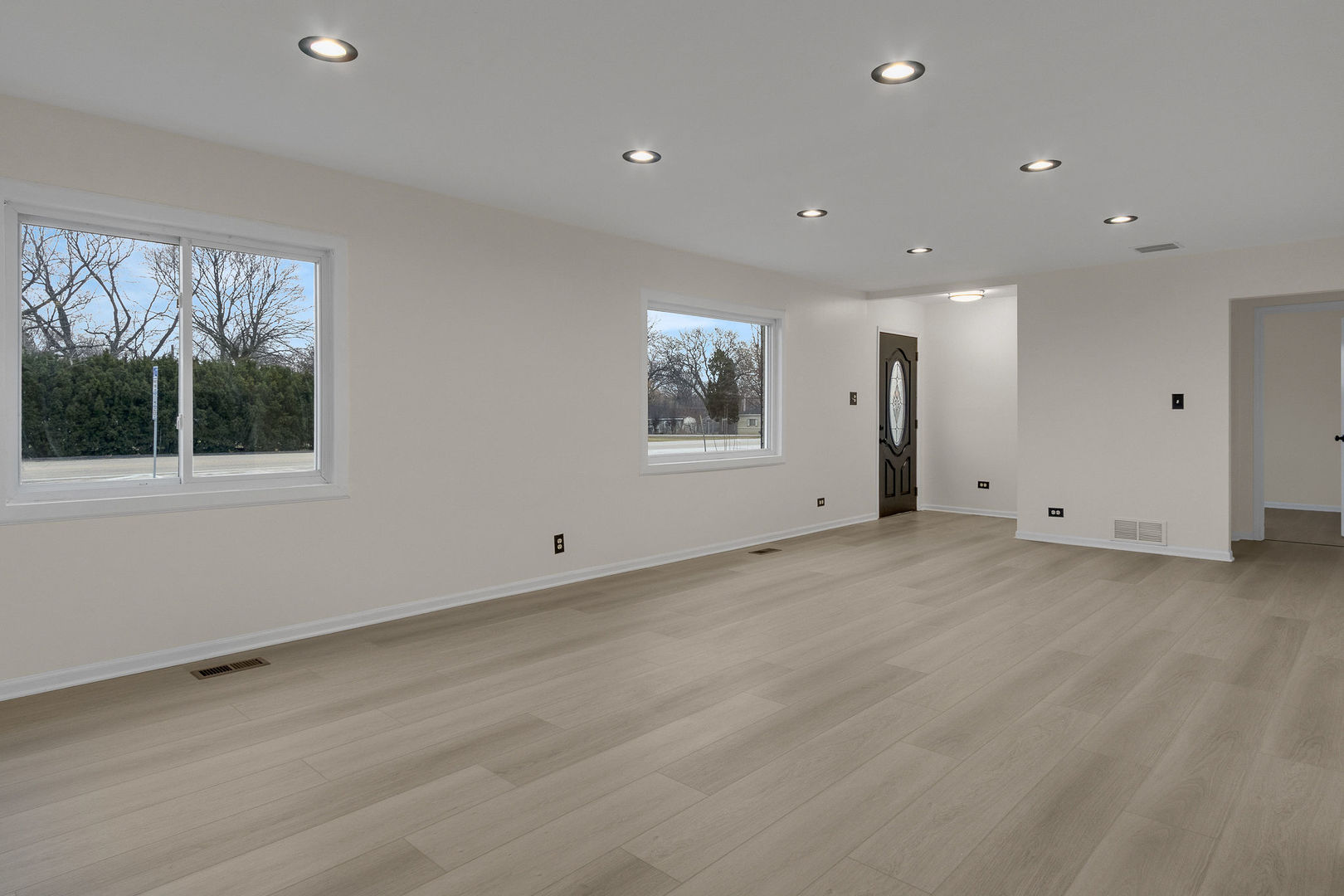 1190 Ash Road Hoffman Estates, IL 60169 - Photo 4 of 27 a view of a livingroom with a dishwasher and a window