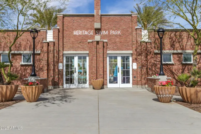 a front view of a house with outdoor seating