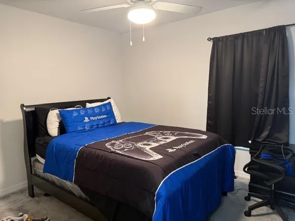 a bedroom with a bed and a closet