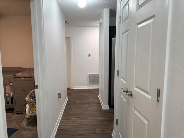 a view of a bathroom from the hallway