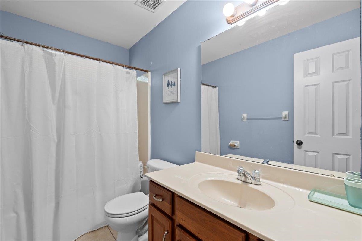 10941 Lubov Road Arlington, TN 38002 - Photo 18 of 39 a bathroom with a sink toilet and a mirror