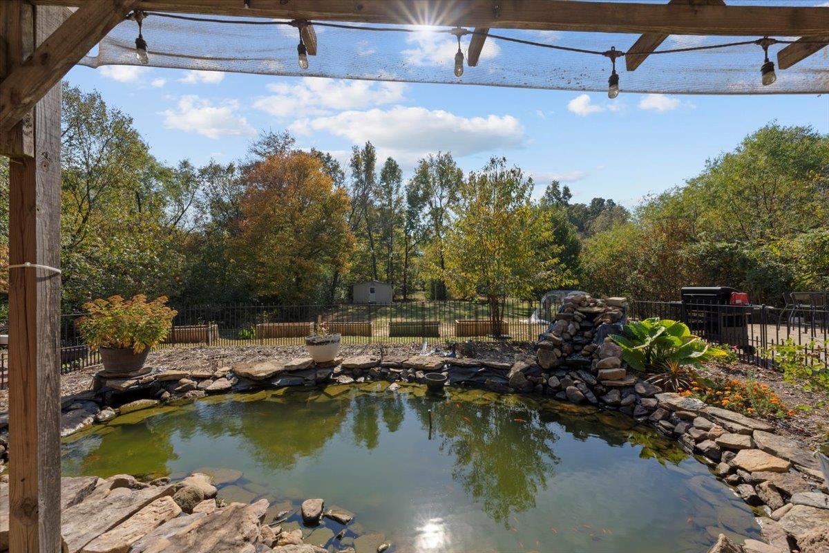 10941 Lubov Road Arlington, TN 38002 - Photo 32 of 39 a view of a lake with a mountain