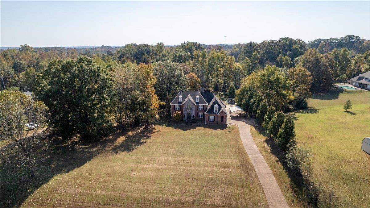 10941 Lubov Road Arlington, TN 38002 - Photo 36 of 39 a view of a lake with a mountain in the background