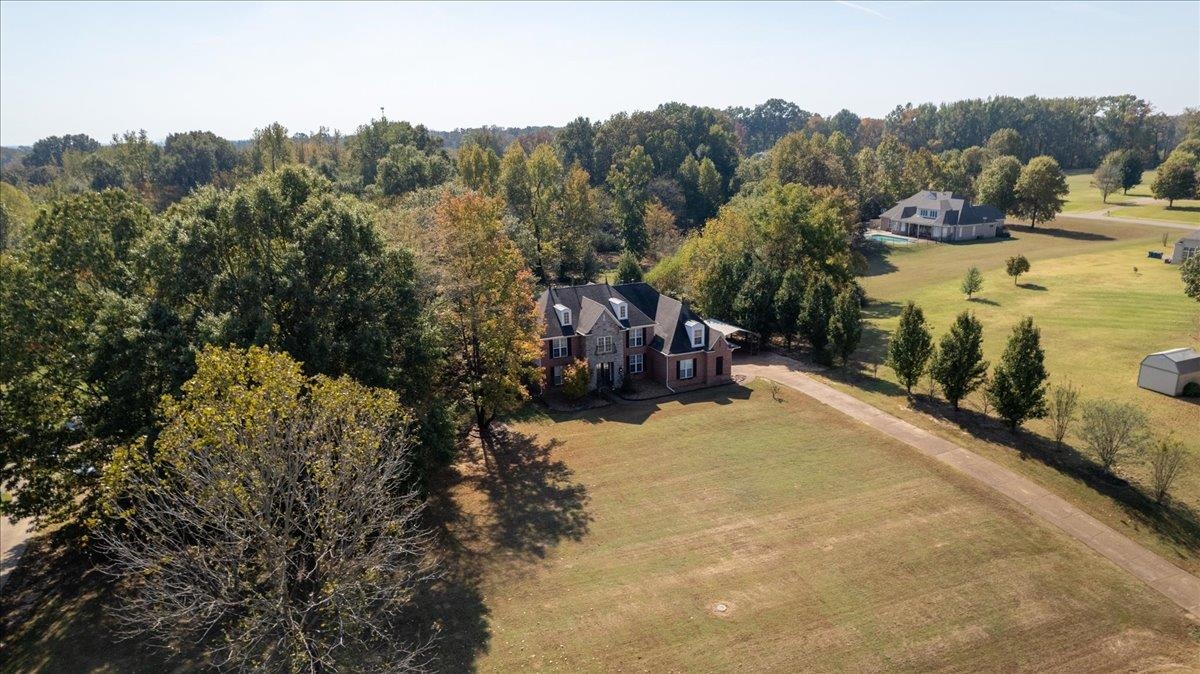 10941 Lubov Road Arlington, TN 38002 - Photo 37 of 39 a view of a road with a building in the background