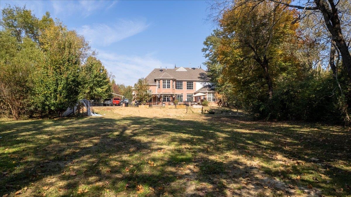 10941 Lubov Road Arlington, TN 38002 - Photo 38 of 39 a view of a house with a yard