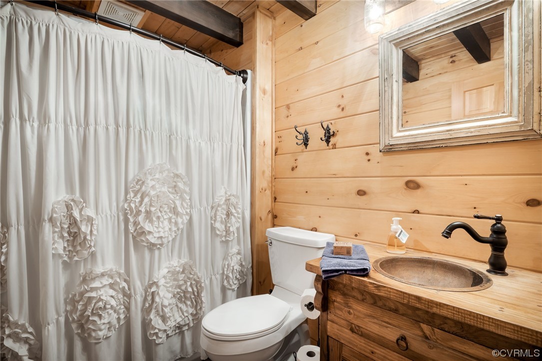 1797 Flattop Mountain Road Free Union, VA 22940 - Photo 35 of 43 Bathroom with vanity, mirror, wood ceiling, and beam ceiling