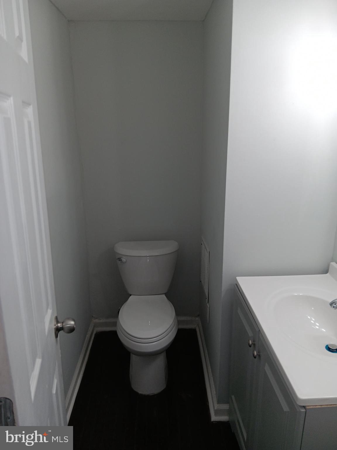 1020 Potter Street Chester, PA 19013 - Photo 13 of 16 a bathroom with a toilet and a sink
