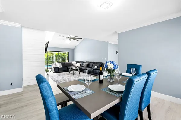 a kitchen with stainless steel appliances a sink stove top oven and cabinets