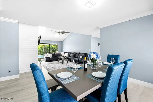 a kitchen with stainless steel appliances a sink stove top oven and cabinets