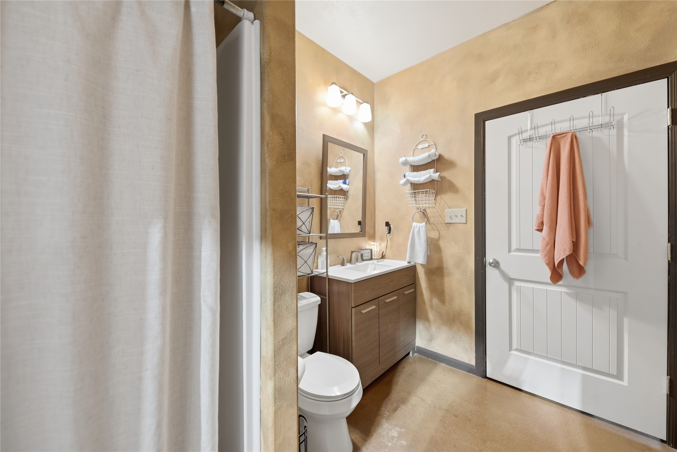 25062 Highway 159 East Hempstead, TX 77445 - Photo 14 of 49 a bathroom with a granite countertop sink mirror vanity and toilet
