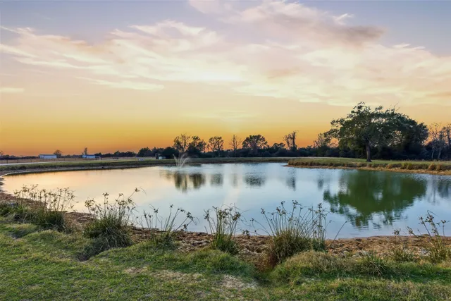 a view of kitchen with wooden floor and window
