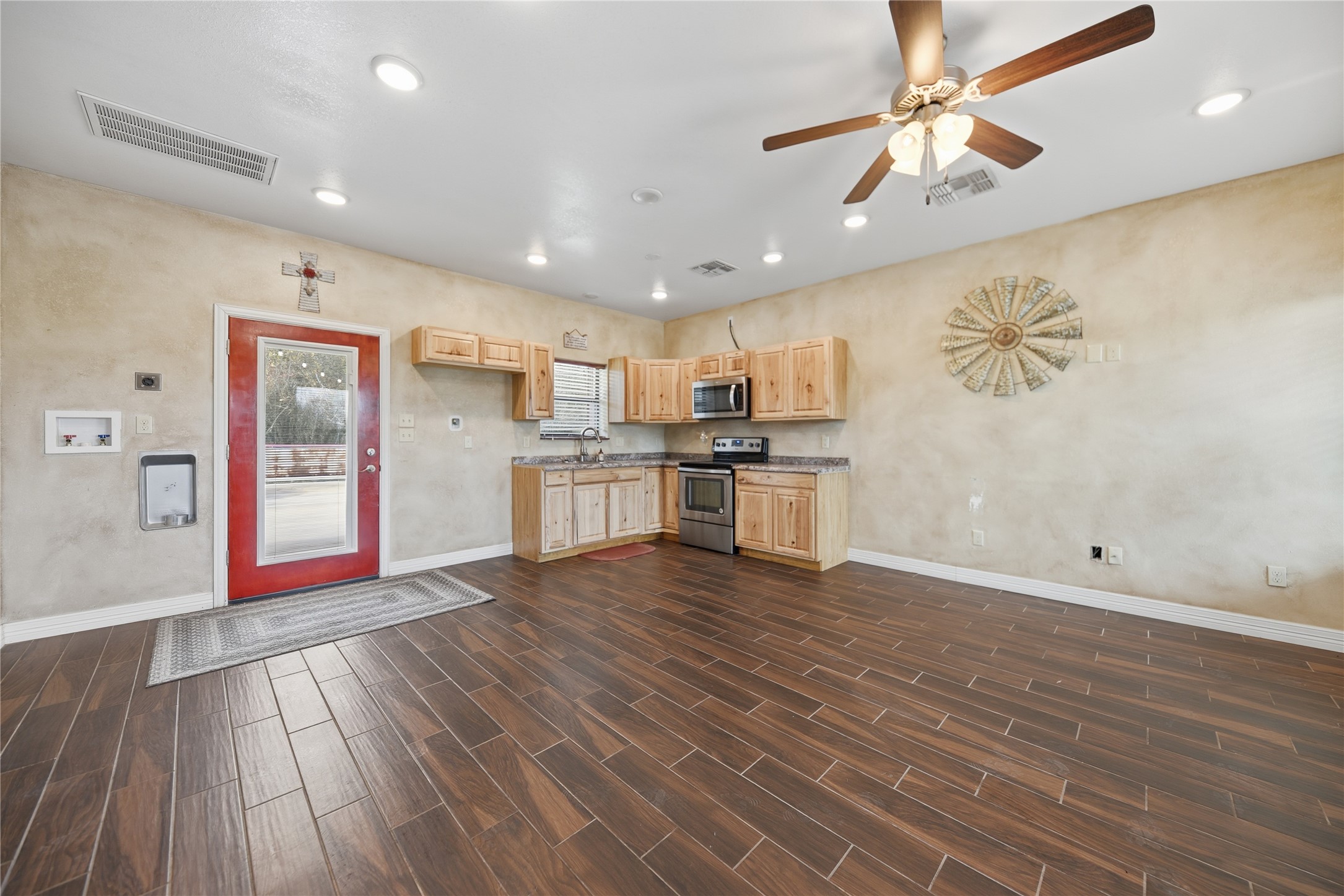 25062 Highway 159 East Hempstead, TX 77445 - Photo 39 of 49 a view of kitchen with wooden floor and window