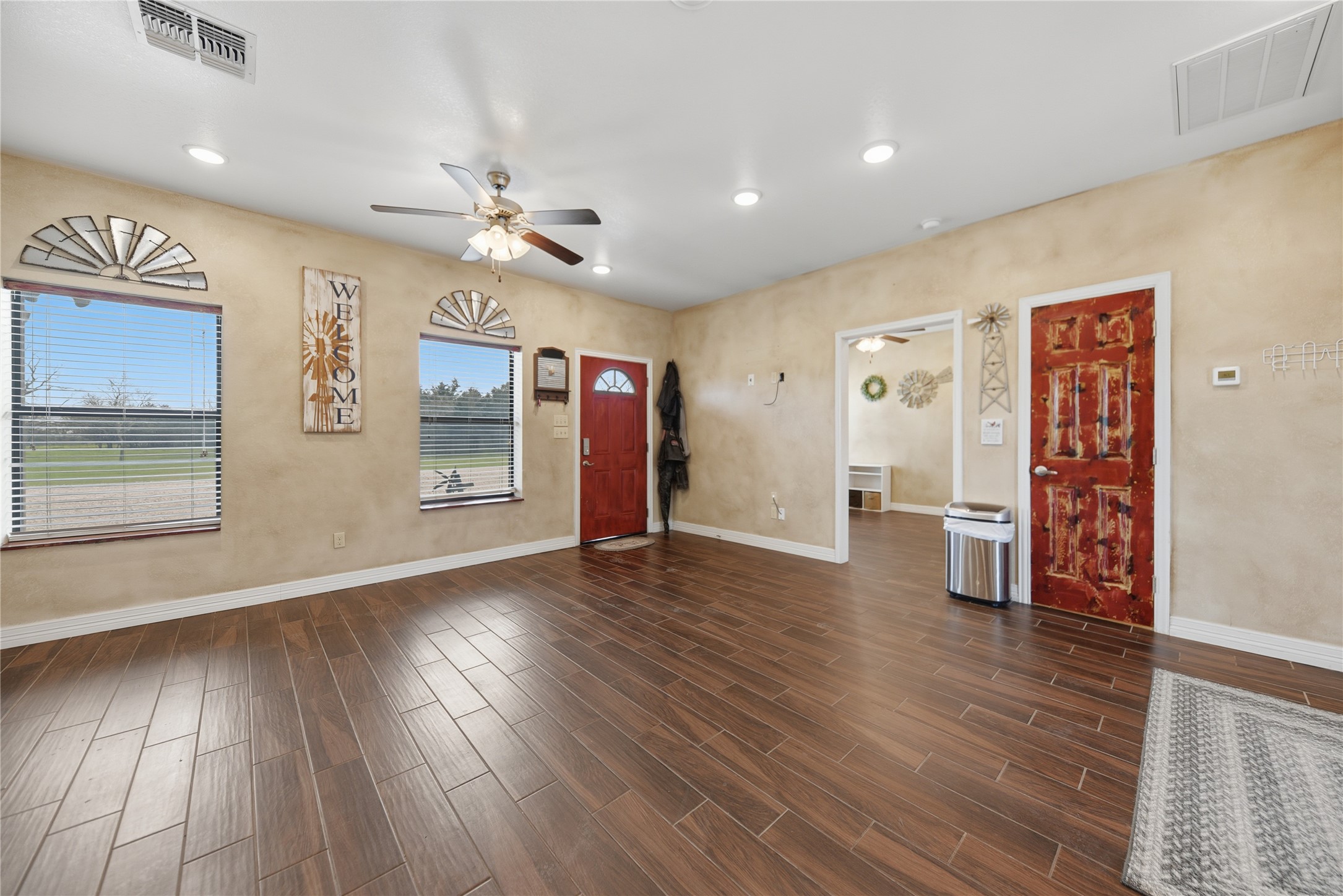 25062 Highway 159 East Hempstead, TX 77445 - Photo 41 of 49 a view of an empty room with window and wooden floor