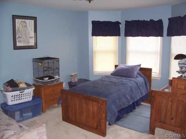 5612 Gatebridge Road Richmond, VA 23234 - Photo 7 of 9 a bedroom with a bed and a window