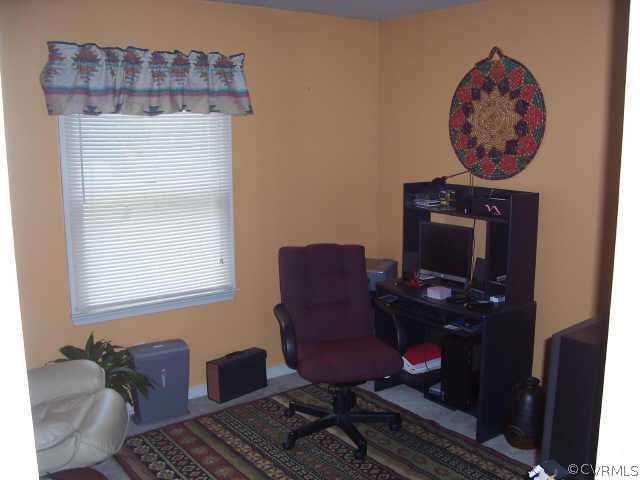 5612 Gatebridge Road Richmond, VA 23234 - Photo 8 of 9 a view of workspace with wooden floor workspace