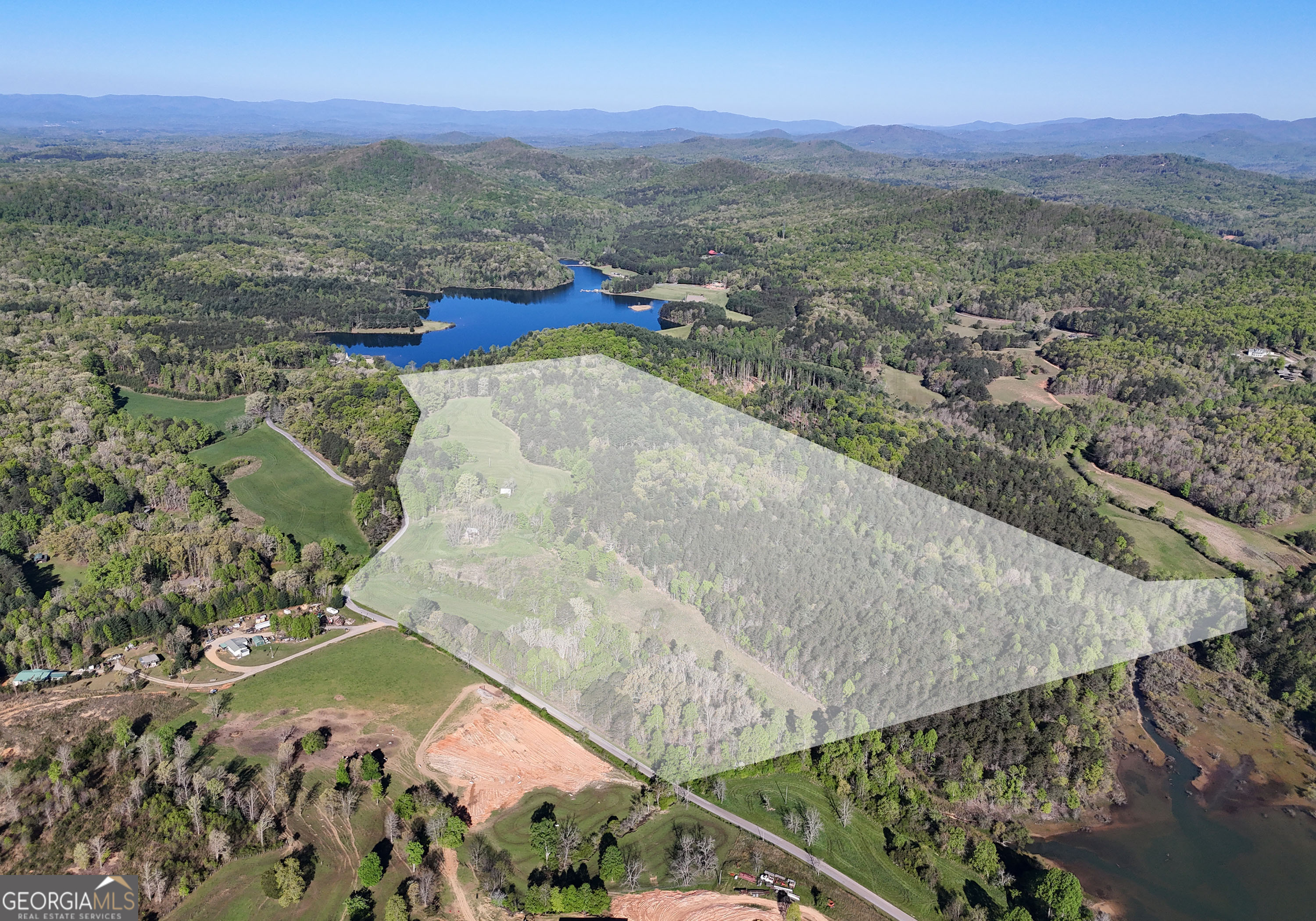 1489 Boy Scout Road Blairsville, GA 30512 - Photo 8 of 43 a view of a yard with a mountain