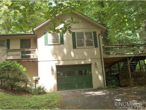 55 Holstein Farm Road Waynesville, NC 28785 - Photo 22 of 24 a front view of a house with a yard