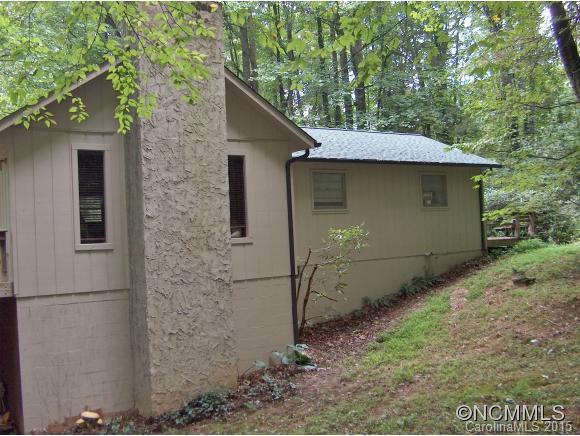 55 Holstein Farm Road Waynesville, NC 28785 - Photo 4 of 24 a backyard of a house with lots of green space