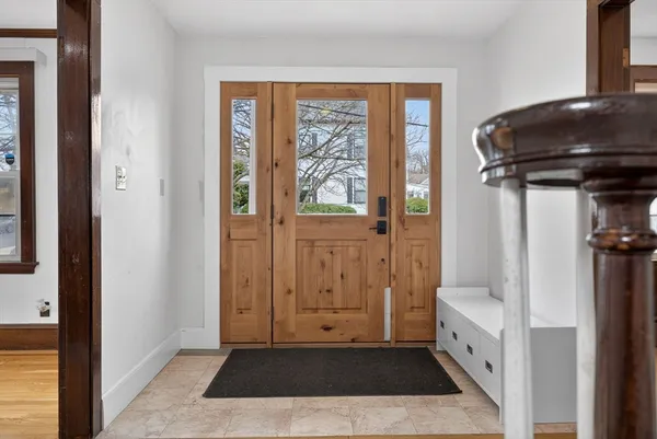 a bathroom with a tub shower and a sink
