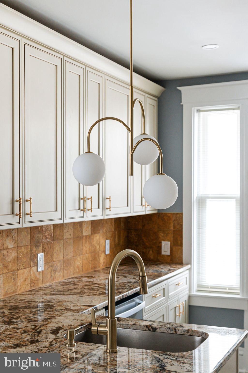 452 South 48th Street Philadelphia, PA 19143 - Photo 14 of 60 a close view of a sink and a table in a room