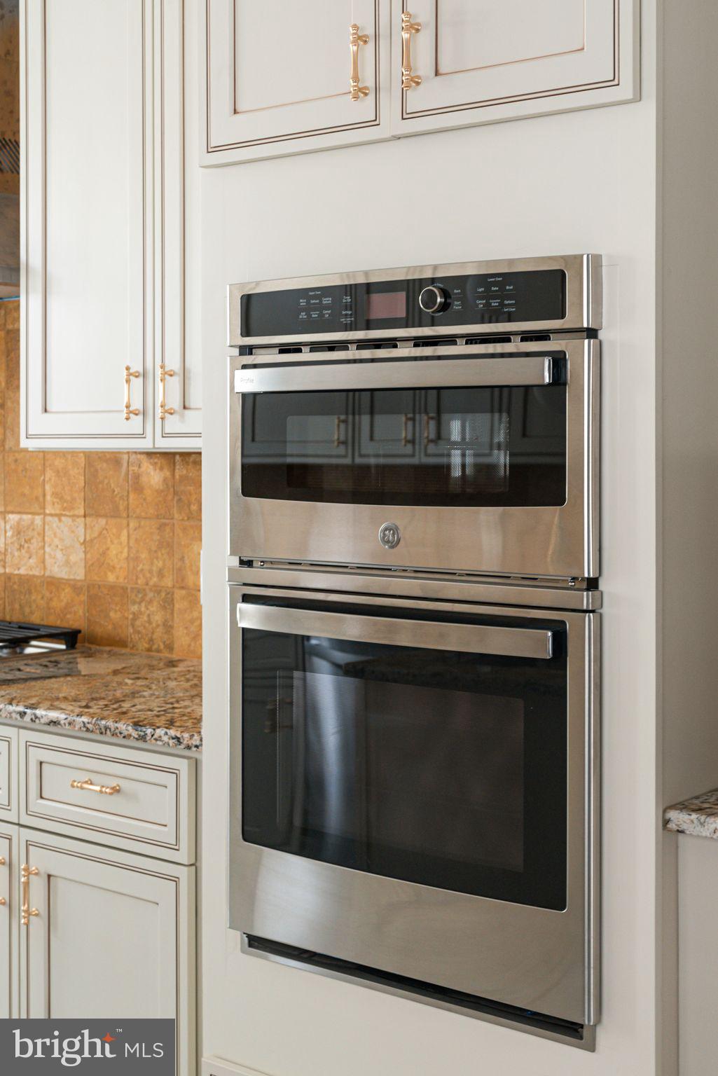 452 South 48th Street Philadelphia, PA 19143 - Photo 17 of 60 a stove top oven sitting inside of a kitchen