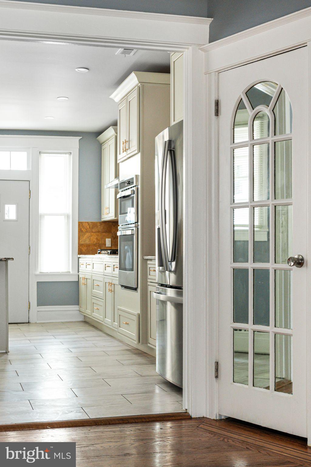 452 South 48th Street Philadelphia, PA 19143 - Photo 20 of 60 a view of a kitchen with furniture and a window