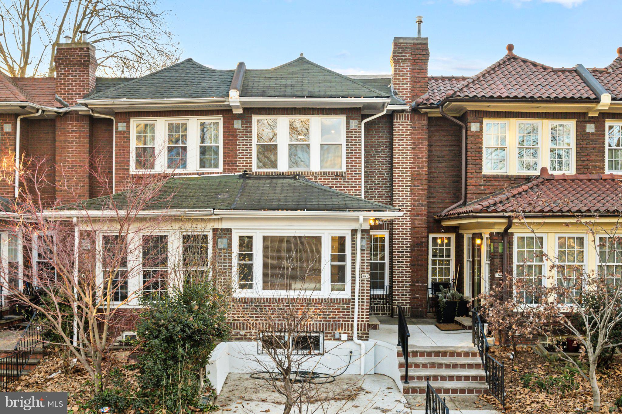 452 South 48th Street Philadelphia, PA 19143 - Photo 2 of 60 front view of a brick house with a window
