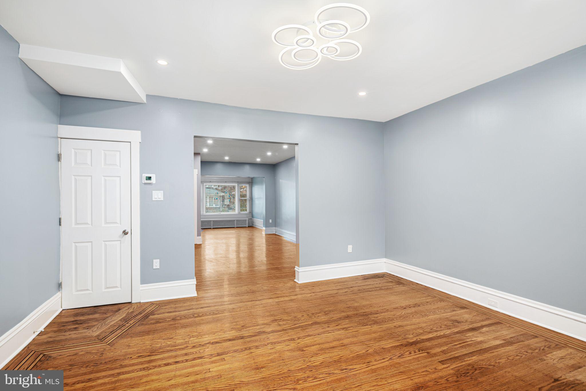 452 South 48th Street Philadelphia, PA 19143 - Photo 23 of 60 a view of empty room with wooden floor and fan