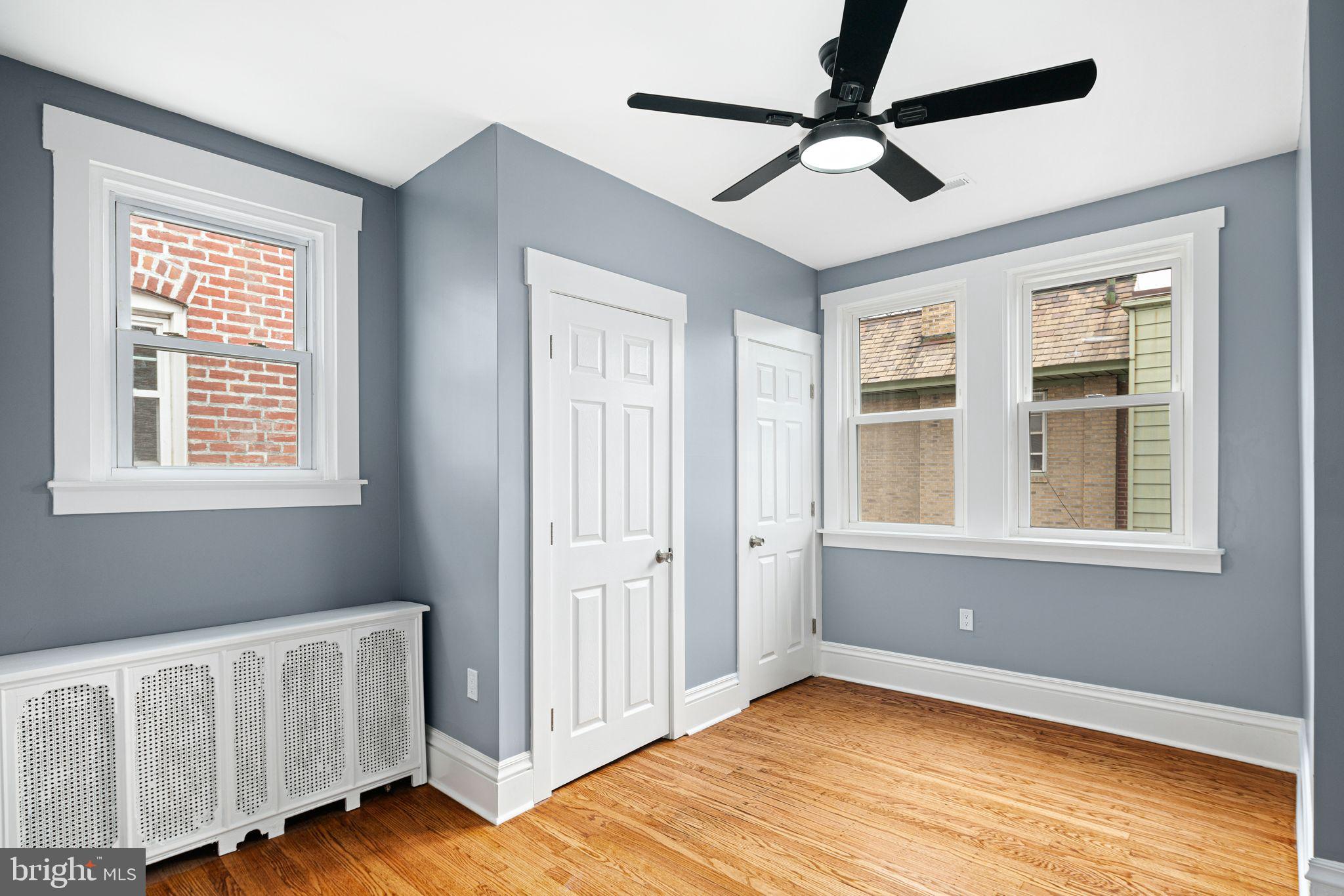 452 South 48th Street Philadelphia, PA 19143 - Photo 28 of 60 a view of an empty room with window and wooden floor