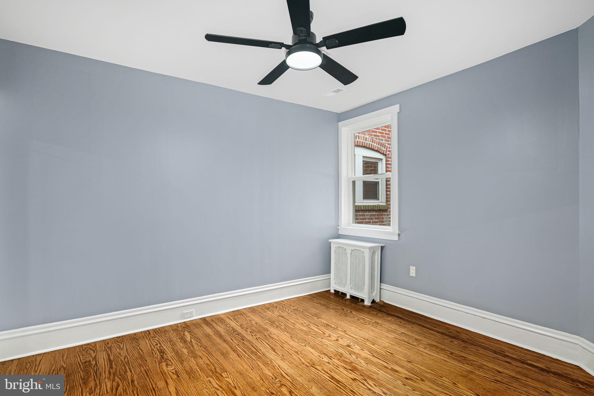 452 South 48th Street Philadelphia, PA 19143 - Photo 30 of 60 a view of empty room with wooden floor