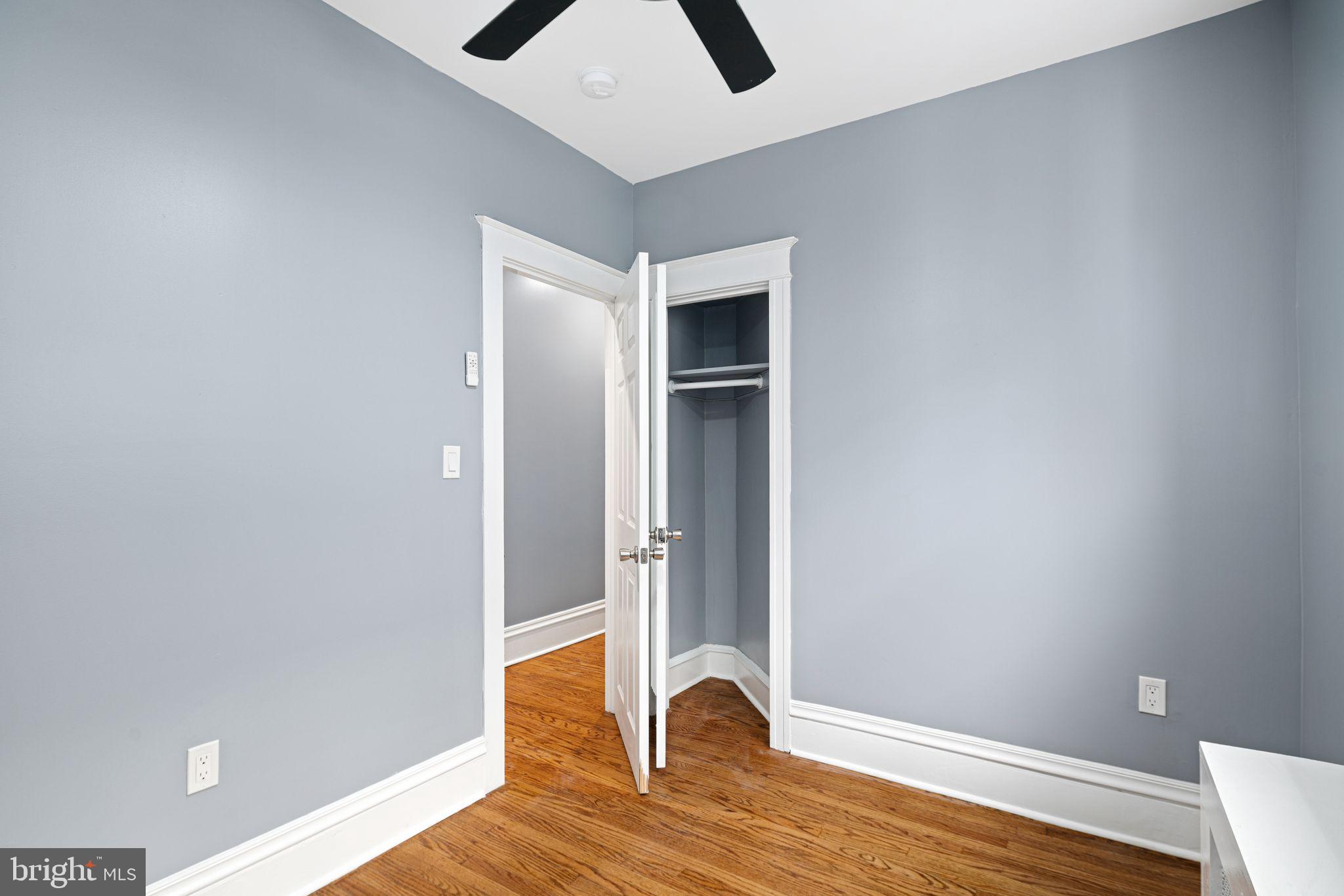 452 South 48th Street Philadelphia, PA 19143 - Photo 31 of 60 a view of an empty room with window and wooden floor