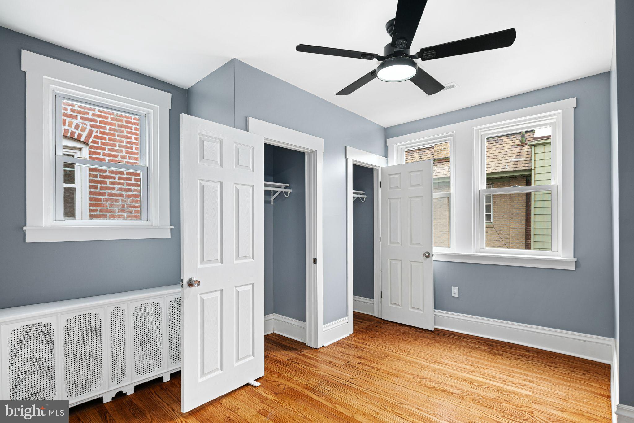 452 South 48th Street Philadelphia, PA 19143 - Photo 32 of 60 a view of an empty room with window and wooden floor