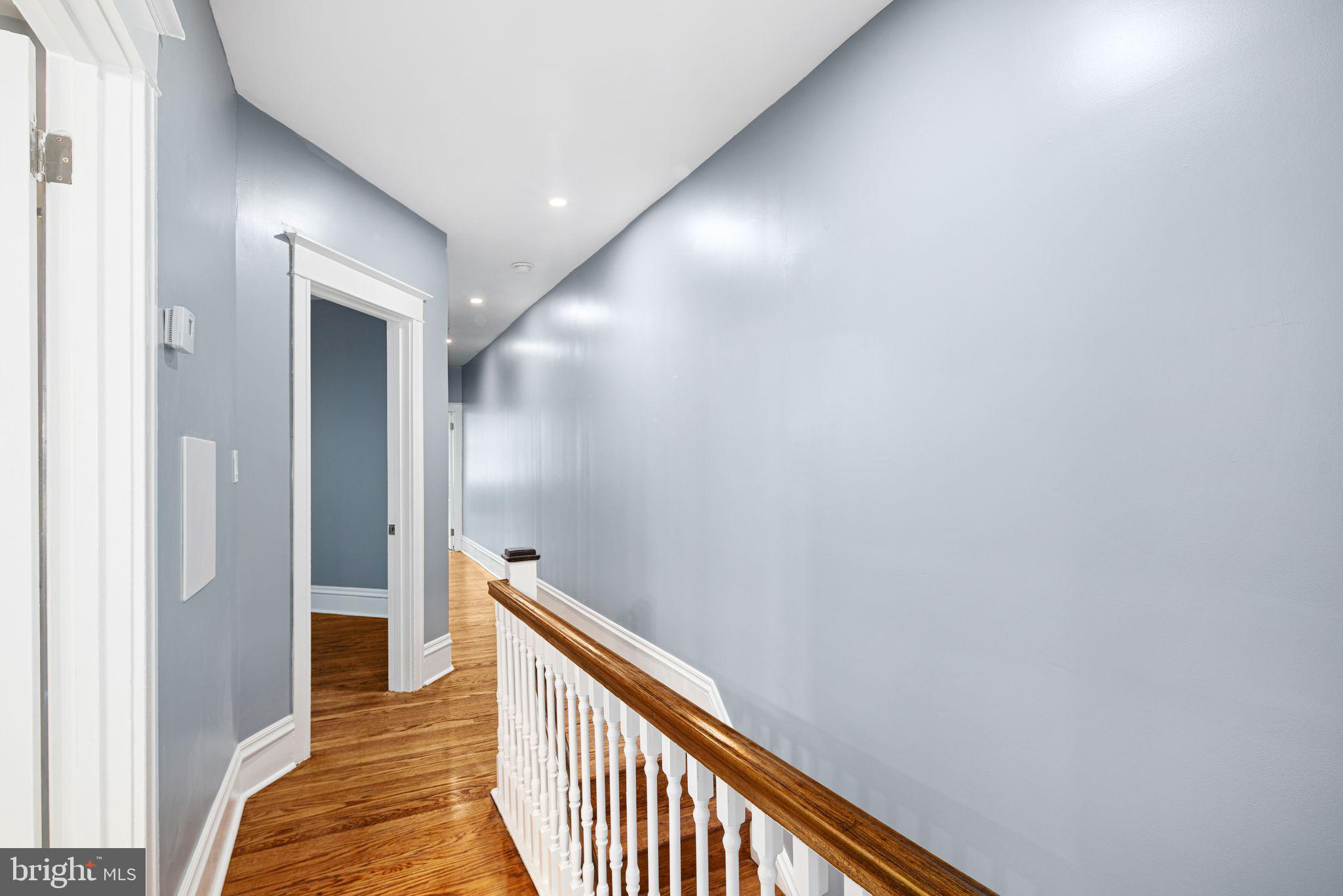 452 South 48th Street Philadelphia, PA 19143 - Photo 47 of 60 a view of a hallway with wooden floor