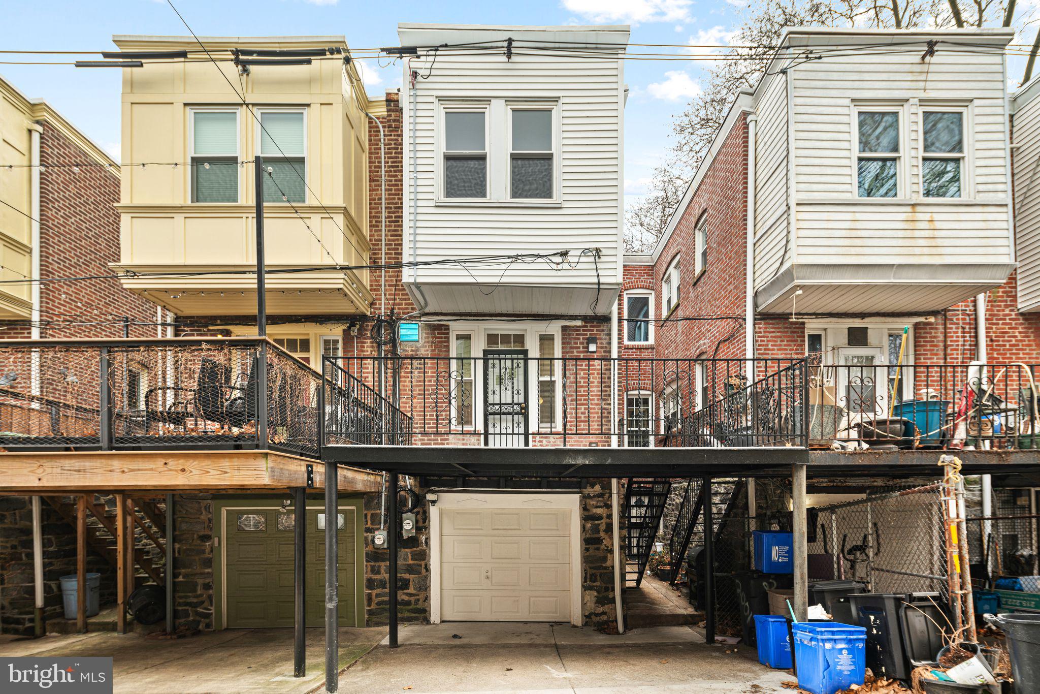 452 South 48th Street Philadelphia, PA 19143 - Photo 60 of 60 a front view of a house with glass windows