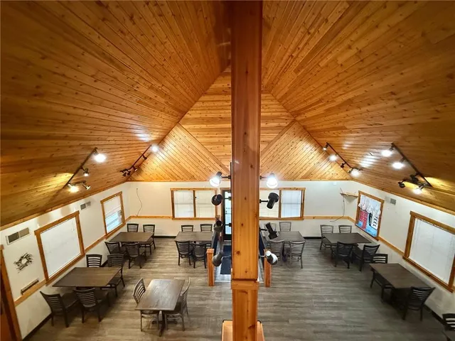 a view of a balcony with chairs