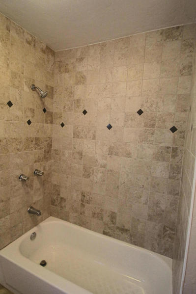 4569 Cedars Road Redding, CA 96001 - Photo 13 of 22 a bathroom with a bathtub