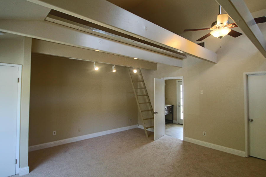 4569 Cedars Road Redding, CA 96001 - Photo 16 of 22 a view of hallway with stairs