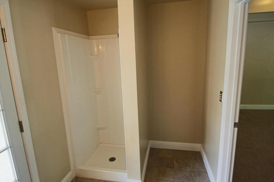 4569 Cedars Road Redding, CA 96001 - Photo 18 of 22 a bathroom with a shower