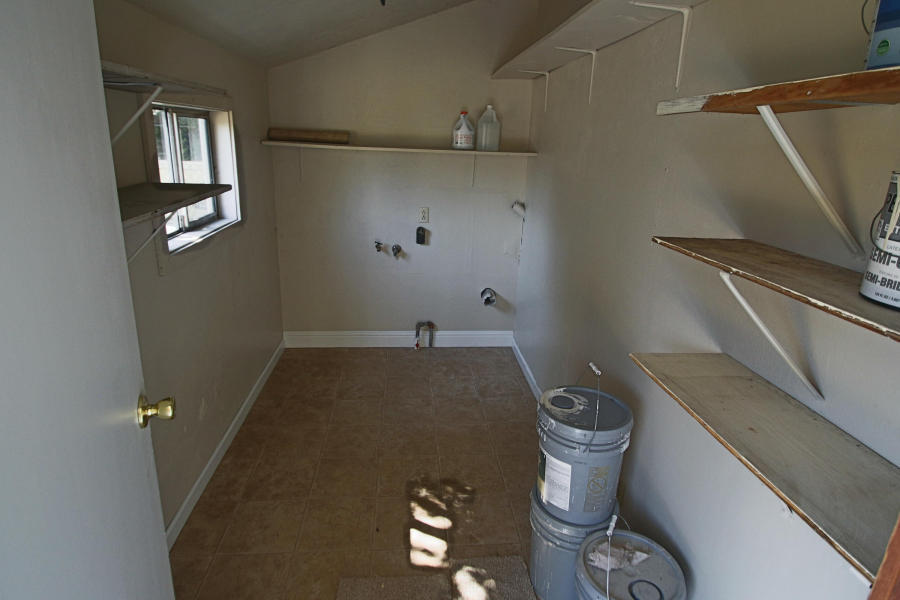 4569 Cedars Road Redding, CA 96001 - Photo 19 of 22 a floor to ceiling window and a rug