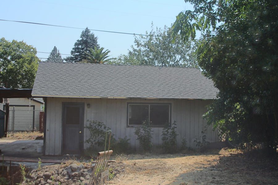 4569 Cedars Road Redding, CA 96001 - Photo 20 of 22 a house with a tree in the background