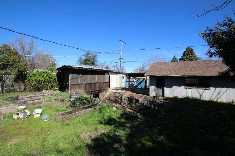 4569 Cedars Road Redding, CA 96001 - Photo 7 of 22 a house view with a garden space
