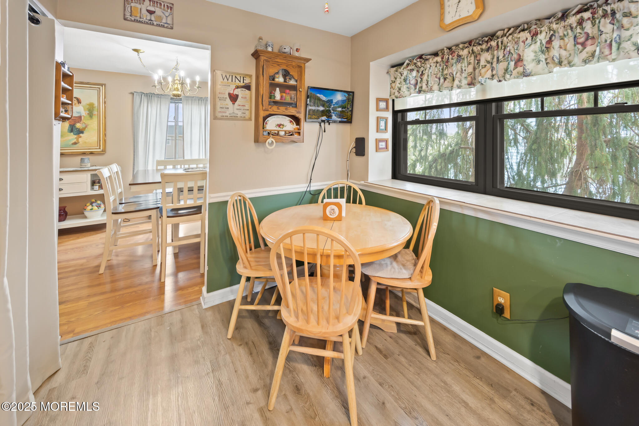 17 Garden Way Howell, NJ 07731 - Photo 17 of 54 a dining room with furniture a window and wooden floor