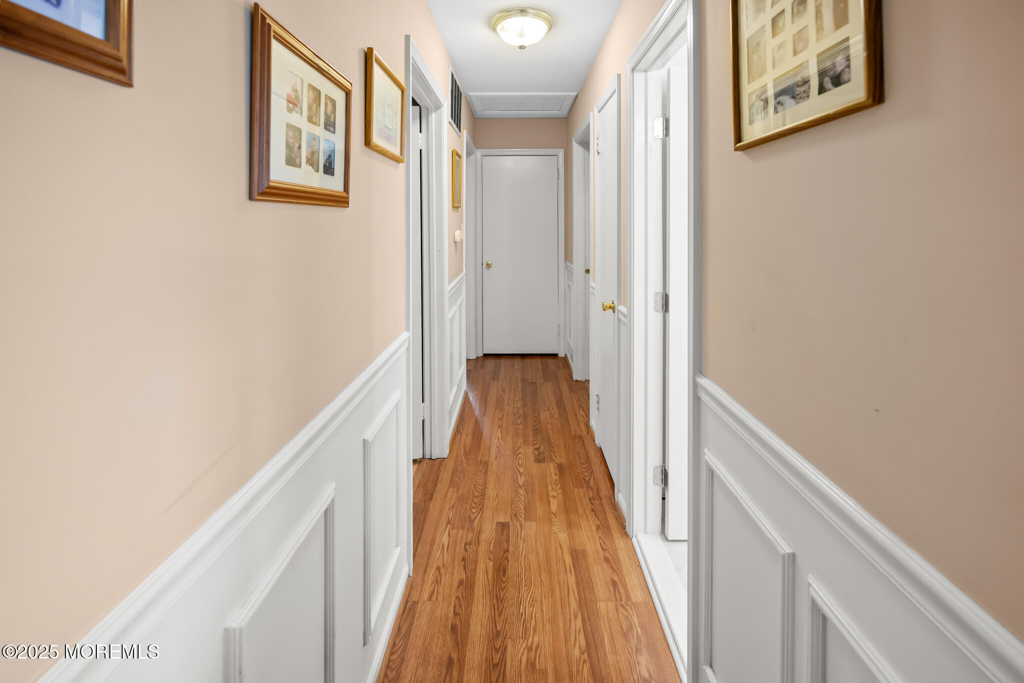 17 Garden Way Howell, NJ 07731 - Photo 21 of 54 a view of a hallway with wooden floor and staircase