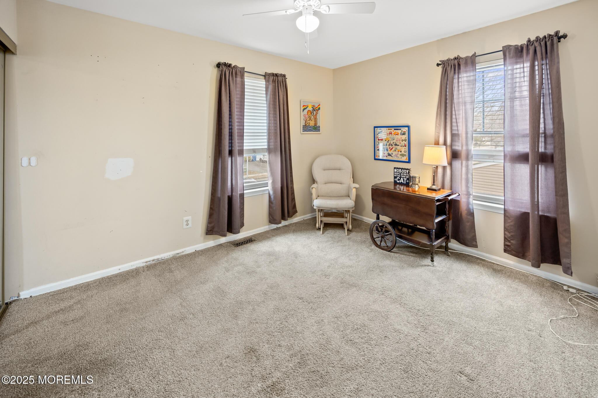 17 Garden Way Howell, NJ 07731 - Photo 26 of 54 a view of a livingroom with furniture and a window