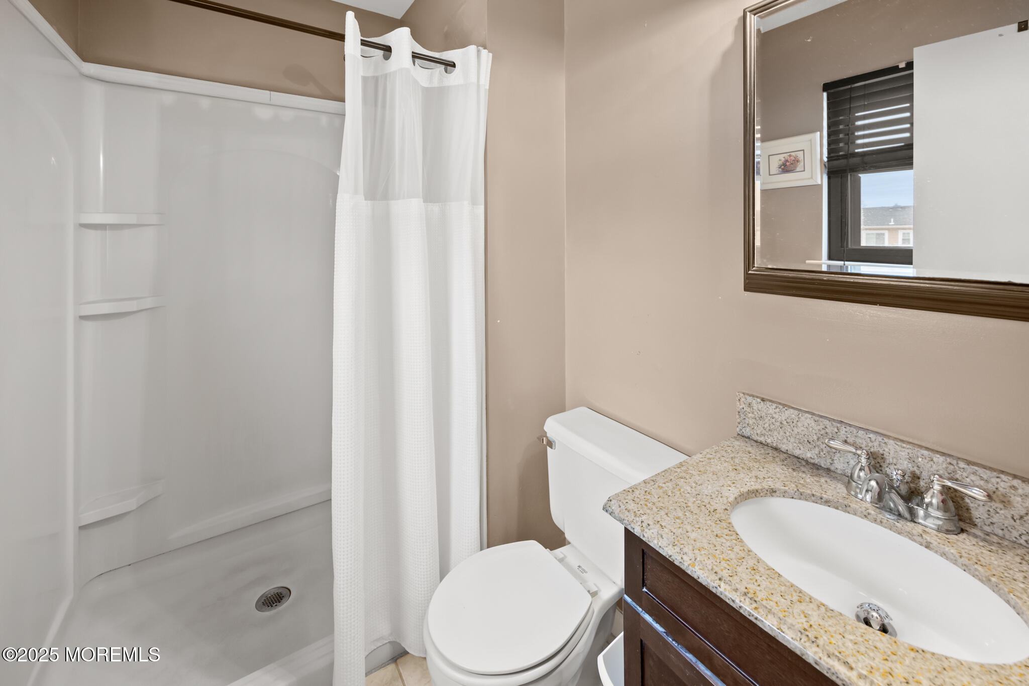 17 Garden Way Howell, NJ 07731 - Photo 31 of 54 a bathroom with a sink toilet and shower