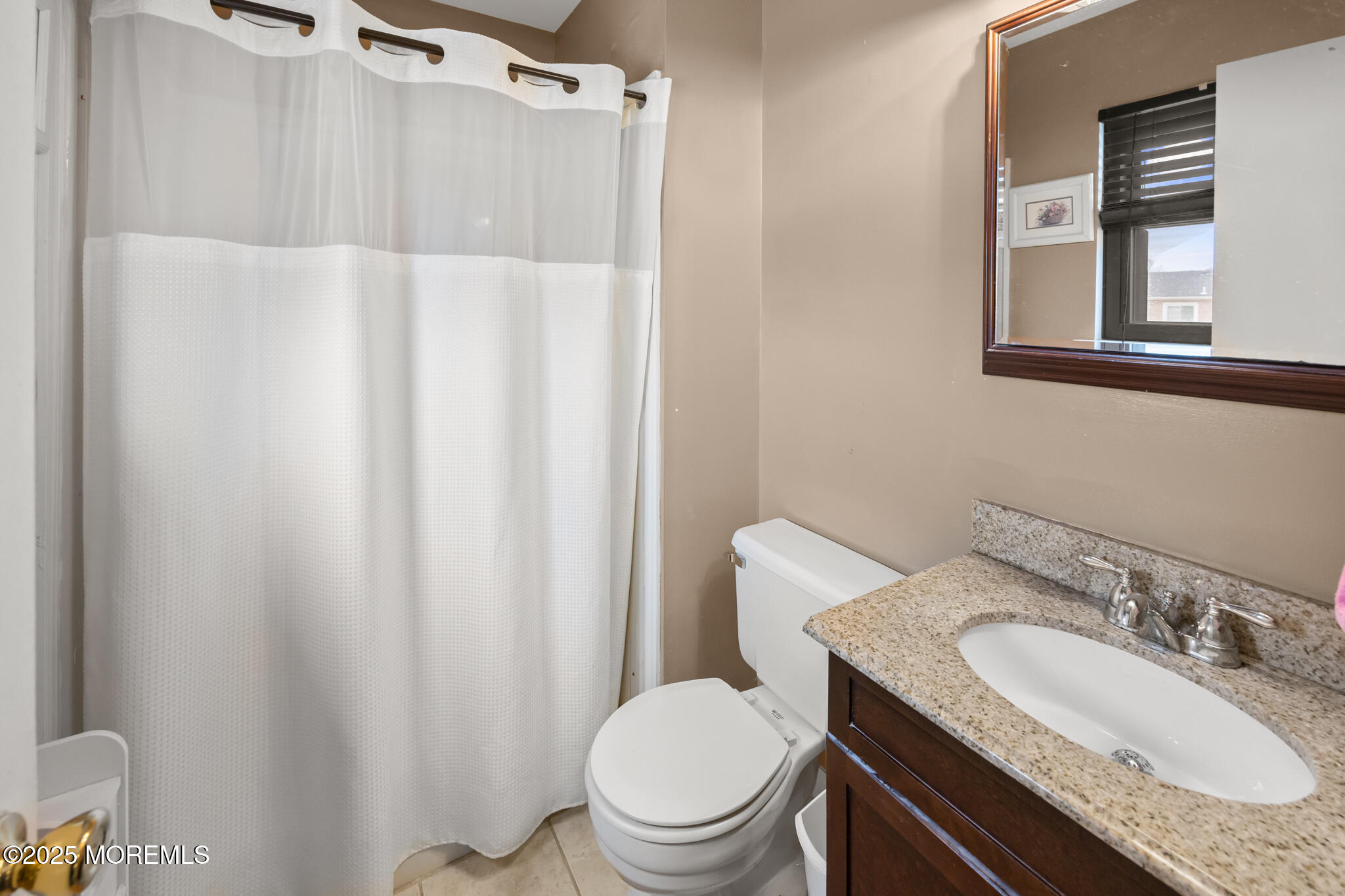 17 Garden Way Howell, NJ 07731 - Photo 32 of 54 a bathroom with a granite countertop sink toilet and a mirror