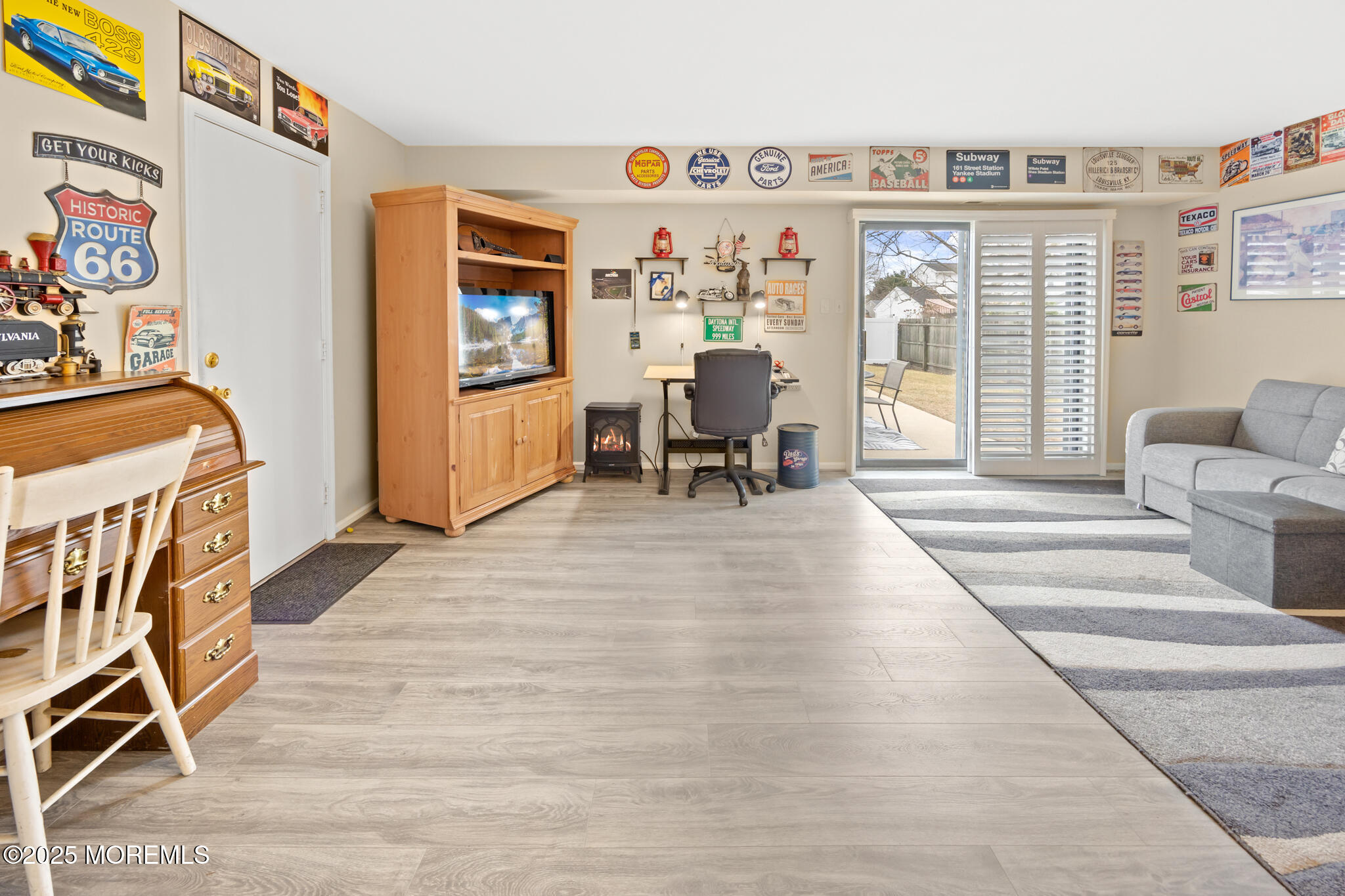 17 Garden Way Howell, NJ 07731 - Photo 34 of 54 a living room with furniture and wooden floor