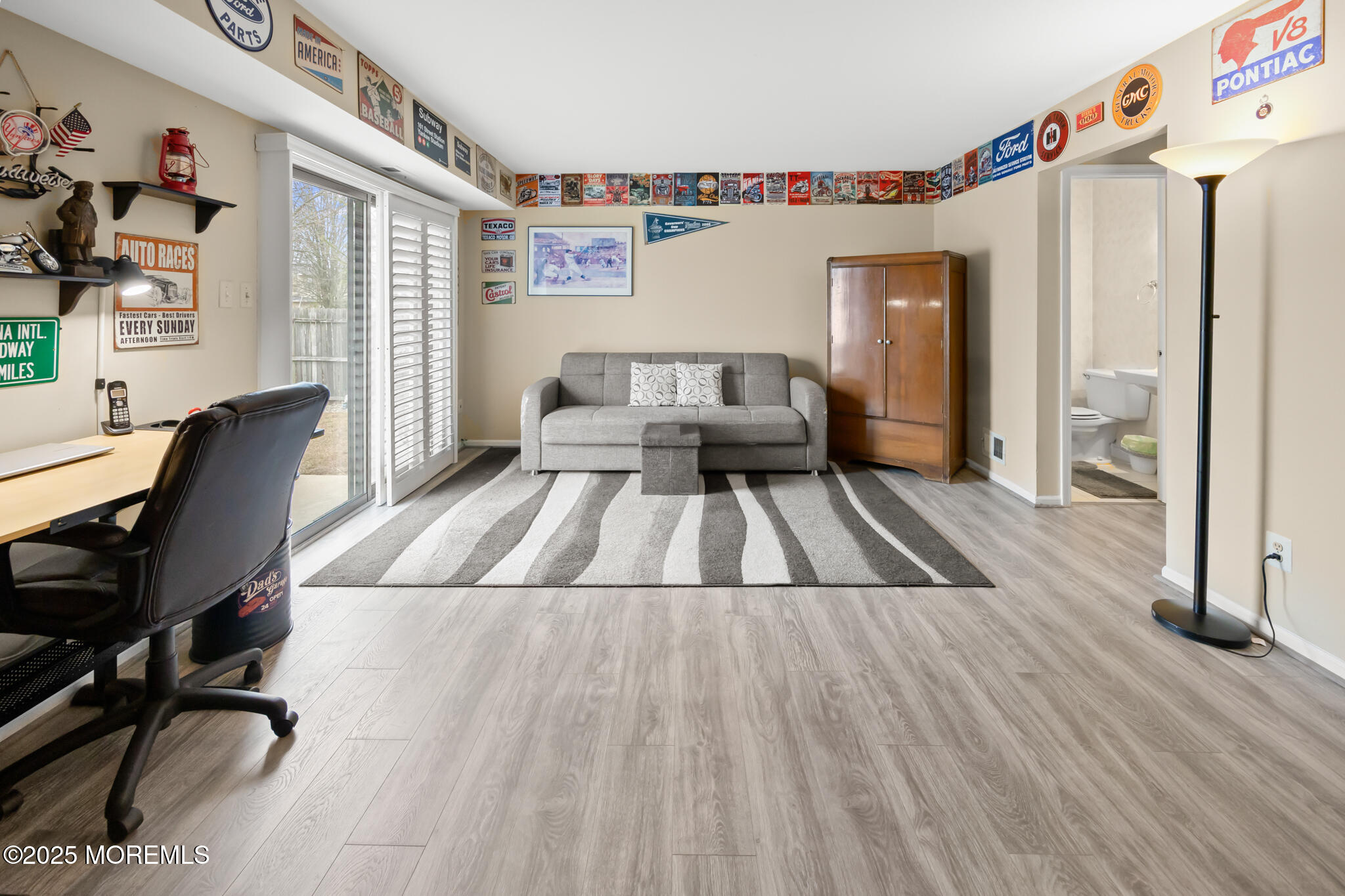 17 Garden Way Howell, NJ 07731 - Photo 36 of 54 a living room with a couch and a table