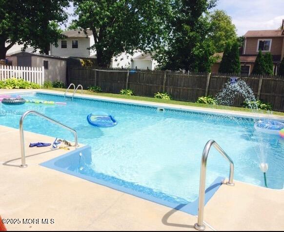 17 Garden Way Howell, NJ 07731 - Photo 47 of 54 a view of swimming pool with a backyard
