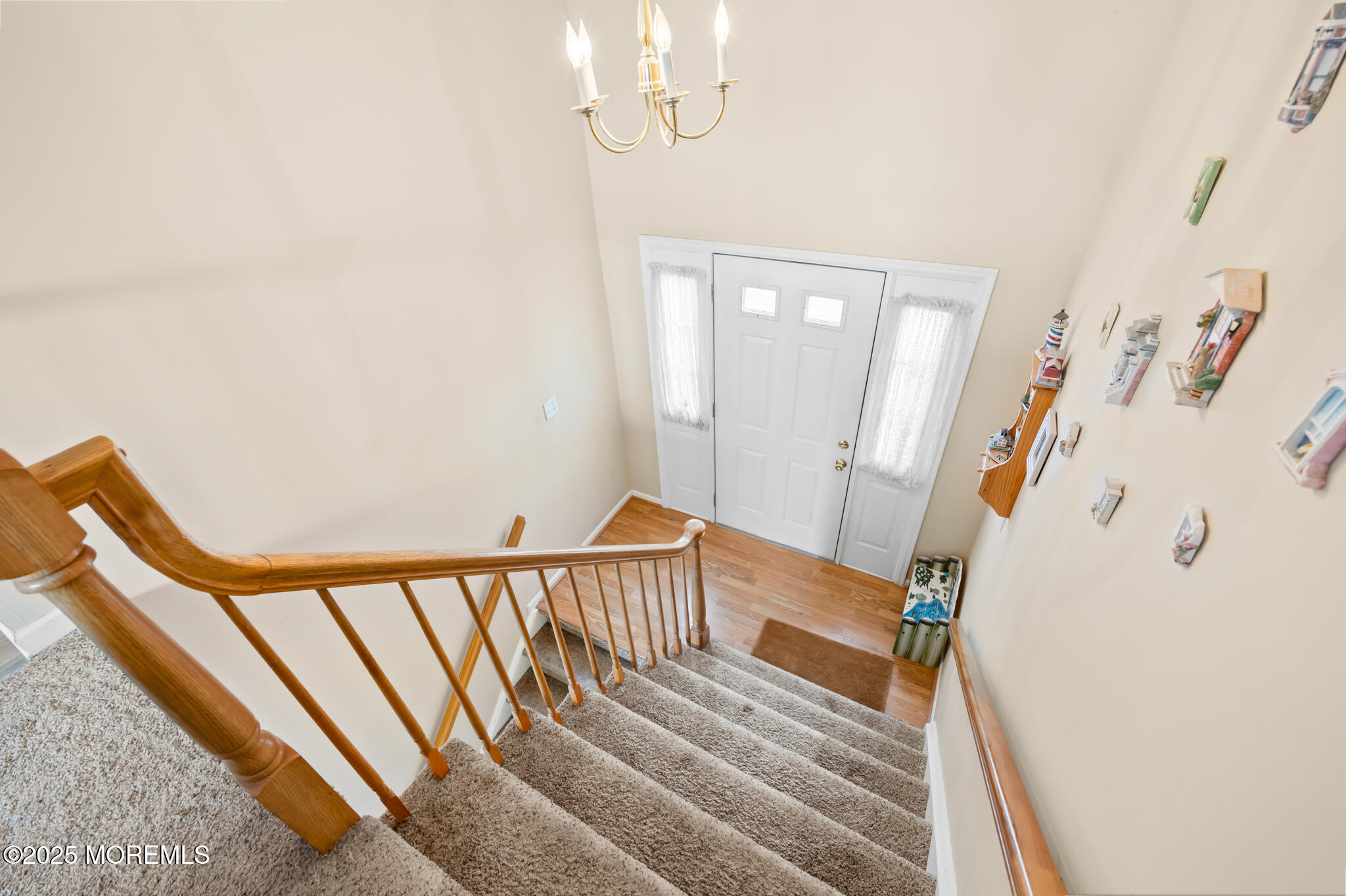 17 Garden Way Howell, NJ 07731 - Photo 6 of 54 a view of a livingroom with wooden floor and stairs